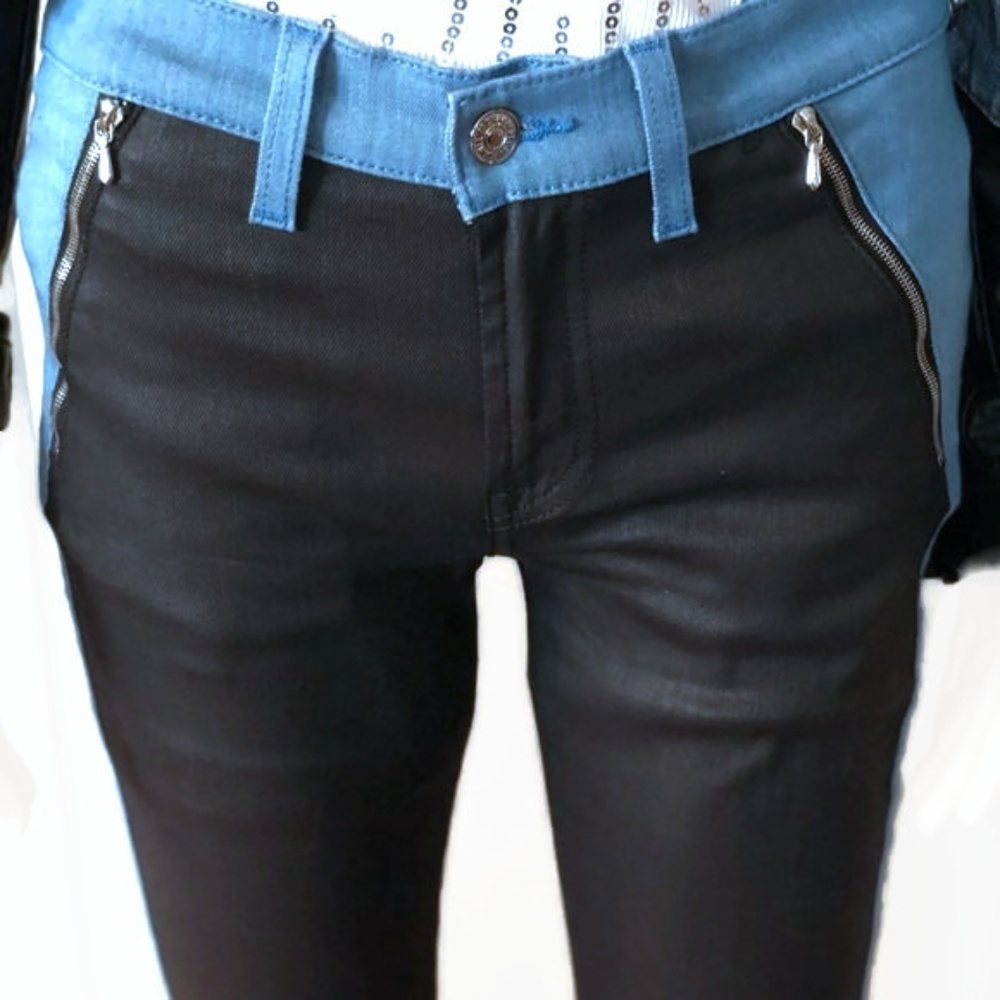 Woman’s 7 For All Mankind blue and black jeans.
